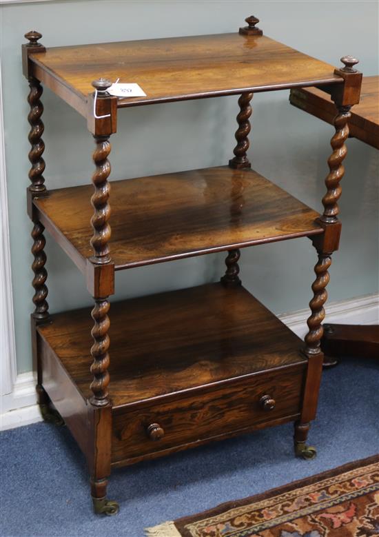 A Victorian rosewood three tier whatnot, on spiral turned and square supports, base drawer, on turned legs with W.51cm
